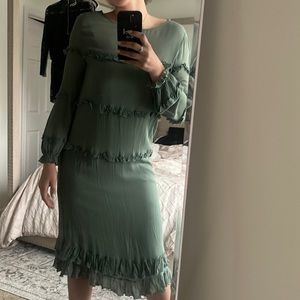 Soft green ruffled dress from dry goods.